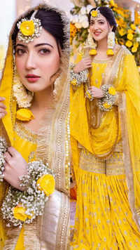 Pakistani <i class="tbold">actress</i> Aymen Saleem stunned in a yellow gharara at her Mayun ceremony