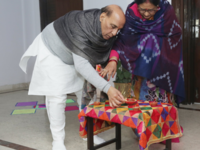 ​<i class="tbold">defence minister</i> Rajnath Singh lights lamp welcoming Lord Ram