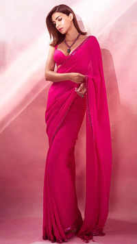 Kriti Sanon channels her inner 'Desi Barbie' in a beautiful rani pink saree