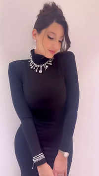 Nora Fatehi’s birthday attire in a classy black bodycon dress is party fashion goals