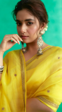 Madhuri Dixit looks like a ray of sunshine in a yellow mirror work