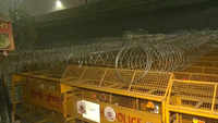 Heavy <i class="tbold">barricades</i> set up