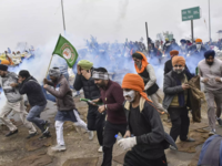 Tear gas <i class="tbold">shell</i>s fired at protesters