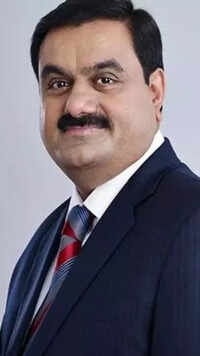 <i class="tbold">gautam adani</i>​