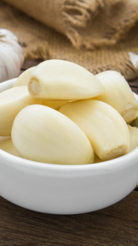 ​Raw garlic with water