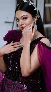 ​In Pics: Bigg Boss Malayalam fame <i class="tbold">soorya</i> shines in her purple gown​