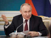 <i class="tbold">Vladimir Putin</i>