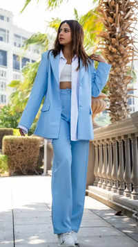 ​Slaying in an oversized light blue and white pantsuit
