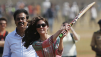 ​April 2016: Catherine plays cricket with children in Mumbai​
