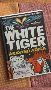 <i class="tbold">the white tiger</i> by Aravind Adiga (2008)