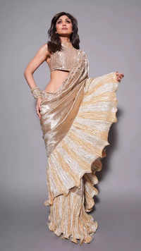 Shilpa Shetty sets the bar high for ethnic fashion in a metallic gold saree