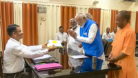 Yogi Adityanath accompanied PM Modi
