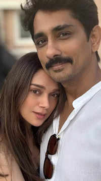 Aditi and <i class="tbold">Siddharth</i>