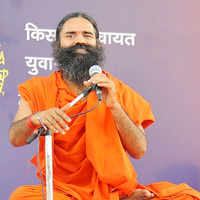 Click here to see the latest images of <i class="tbold">yoga guru swami ramdev</i>