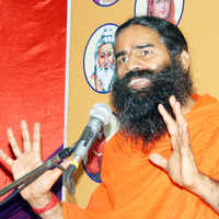 Click here to see the latest images of <i class="tbold">yoga guru swami ramdev</i>