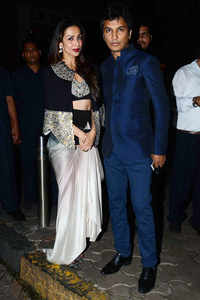 Malaika Arora Khan and Vikram Phadnis arrive at <i class="tbold">queenie singh</i>’s wedding party