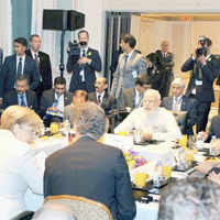 See the latest photos of <i class="tbold">narendra modi meeting top officials</i>