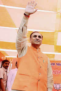 Click here to see the latest images of <i class="tbold">cm vijay rupani</i>