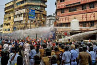 See the latest photos of <i class="tbold">water cannons used against protesters</i>