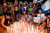Check out our latest images of <i class="tbold">candlelight vigil</i>