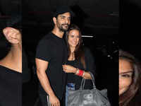 Newlywed couple Angad Bedi and Neha Dhupia spotted at Mumbai airport as they return from U.S.A.