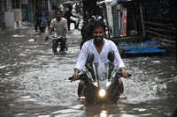 <i class="tbold">monsoon rains</i> paralyse several parts of India