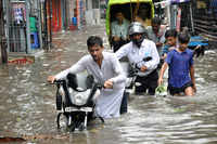 <i class="tbold">monsoon rains</i> paralyse several parts of India