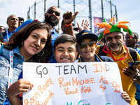 Fan holding a banner during India-Australia match
