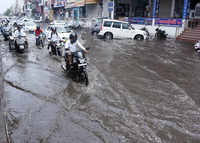 Pre-<i class="tbold">monsoon rains</i> in several parts of country bring respite from heat