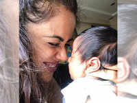 ​Sameera Reddy cuddles up with her month-old daughter, Nyra