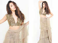 Janhvi Kapoor's mauve cocktail sari and bralette blouse is the
