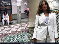 ​Priyanka Chopra gives off major boss lady vibes in a white embossed pantsuit