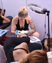 See the latest photos of <i class="tbold">tattoo festival</i>
