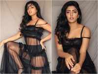 Eesha flaunts her toned figure in a bikini cover-up dress and ups the hotness quotient