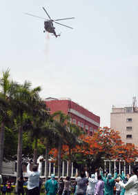 <i class="tbold">armed forces</i> salute 'corona warriors' by showering flower petals from choppers