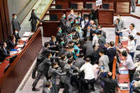 In pics: <i class="tbold">hong kong</i> legislators trade blows