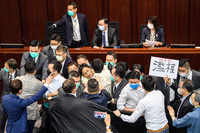 In pics: <i class="tbold">hong kong</i> legislators trade blows