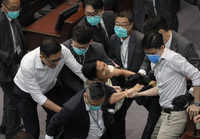 In pics: <i class="tbold">hong kong</i> legislators trade blows
