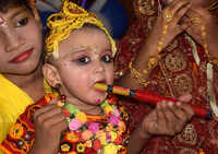 Devotees celebrate Janmashtami with <i class="tbold">religious</i> fervour