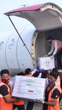 Covid-19 vaccines being unloaded from a flight at Bhubaneswar airport