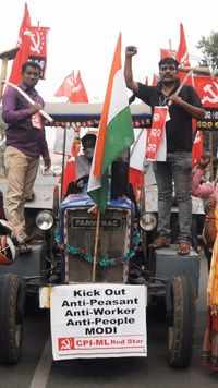 Left party workers take out tractor rally against Centre's 3 farm laws in Bhubaneswar