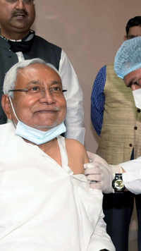 Bihar <i class="tbold">cm</i> Nitish Kumar takes his first dose of Covid jab.
