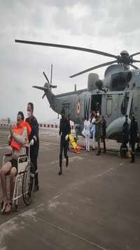 Mumbai: Men rescued by the navy from the Arabian sea being brought for medical attention at naval air station.