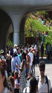 People wait in line to enter the Little Island public park on Hudson River Park in Manhattan in New York City.