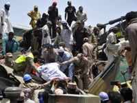 Dead body being recovered from the wreckage