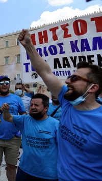 Protesters shout slogans as they take part in Greece's biggest labor unions rally