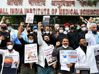Indian Medical Association members participate in a <i class="tbold">nationwide protest</i>