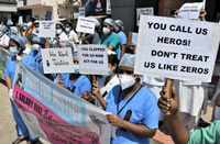 <i class="tbold">health workers</i> protest