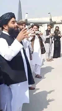 Taliban <i class="tbold">spokesman</i> Zabihullah Mujahid speaks to Badri 313 military unit.