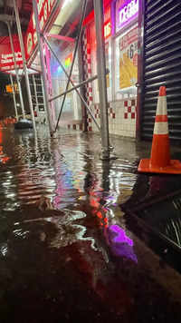 Rainfall from Hurricane Ida has flooded the <i class="tbold">basement</i> of a fast food restaurant.